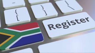 Register text and flag of South Africa on the keyboard