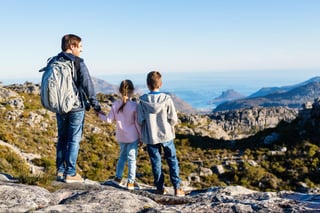 Family father and his two kids enjoying breathtaking views of Cape Town